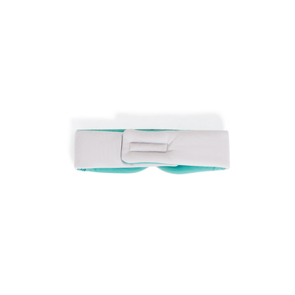 The Mintzzz Chill Mask | Cooling Sleep Mask is a teal and white padded mask with an adjustable strap, designed for comfort and shown laid flat on a white background.